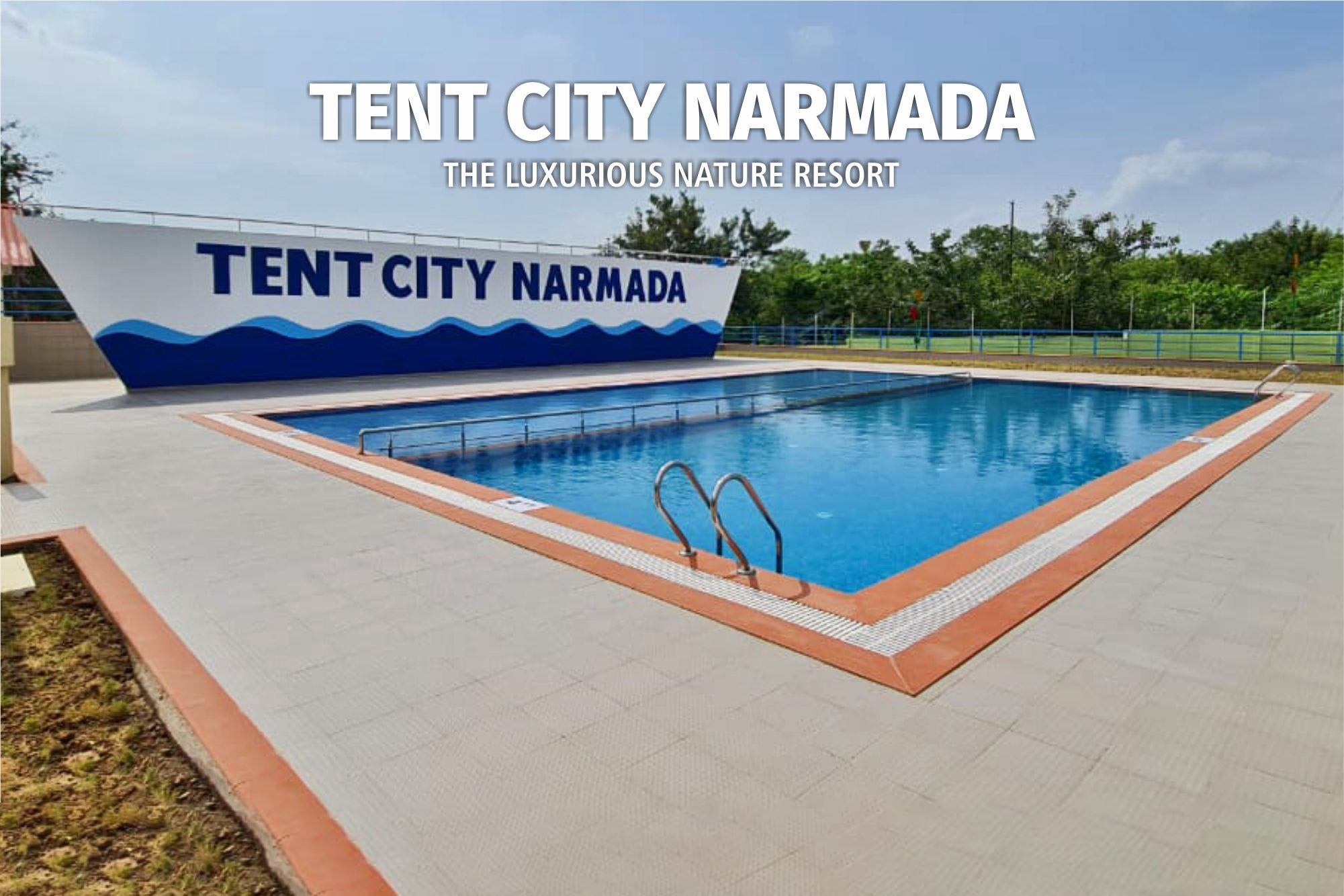 <span  class="uc_style_uc_tiles_grid_image_elementor_uc_items_attribute_title" style="color:#ffffff;">Tent City Narmada Luxurious Resort Night Swimming Pool</span>