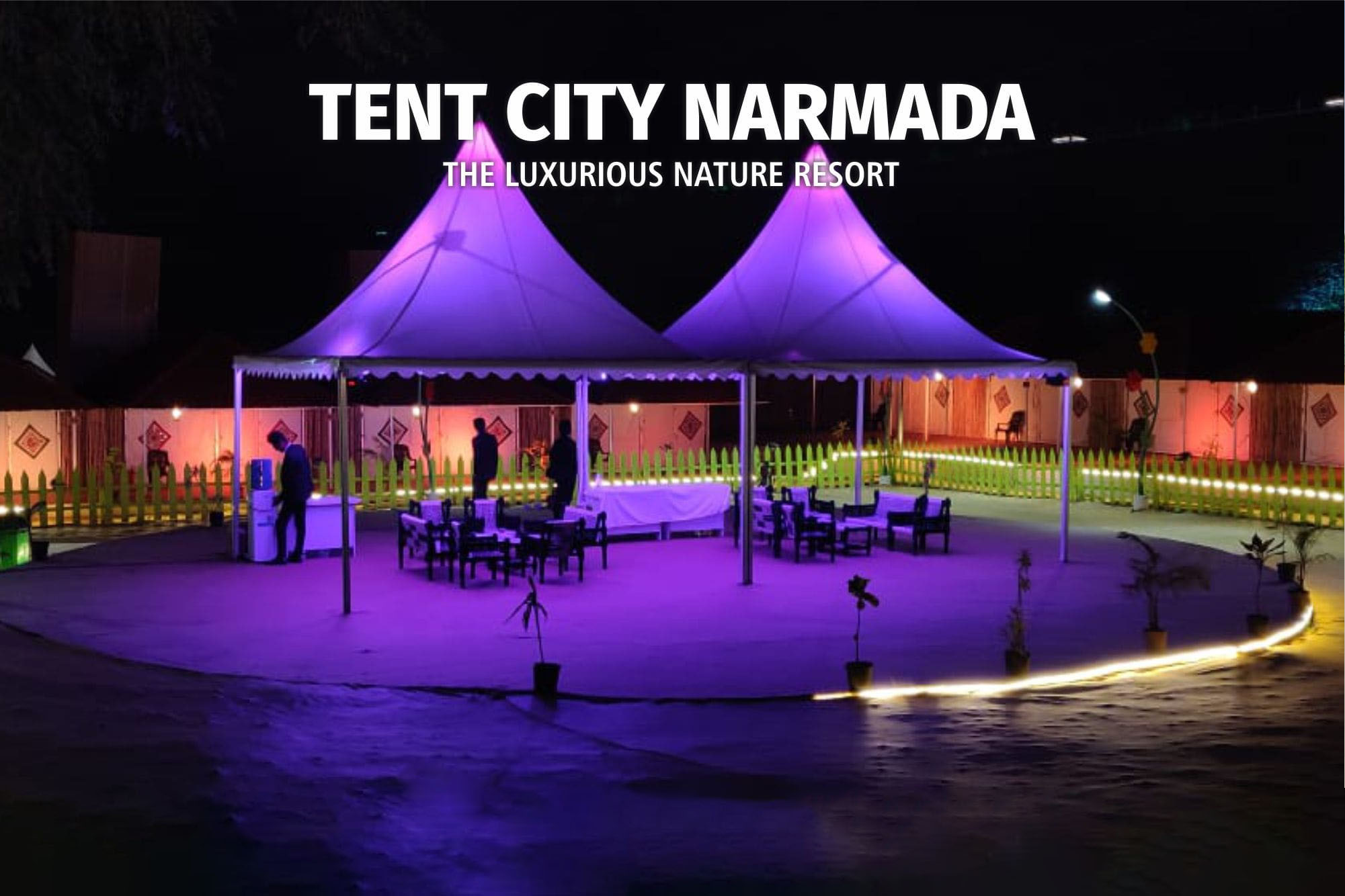 <span  class="uc_style_uc_tiles_grid_image_elementor_uc_items_attribute_title" style="color:#ffffff;">Tent City Narmada Luxurious Resort Night View</span>